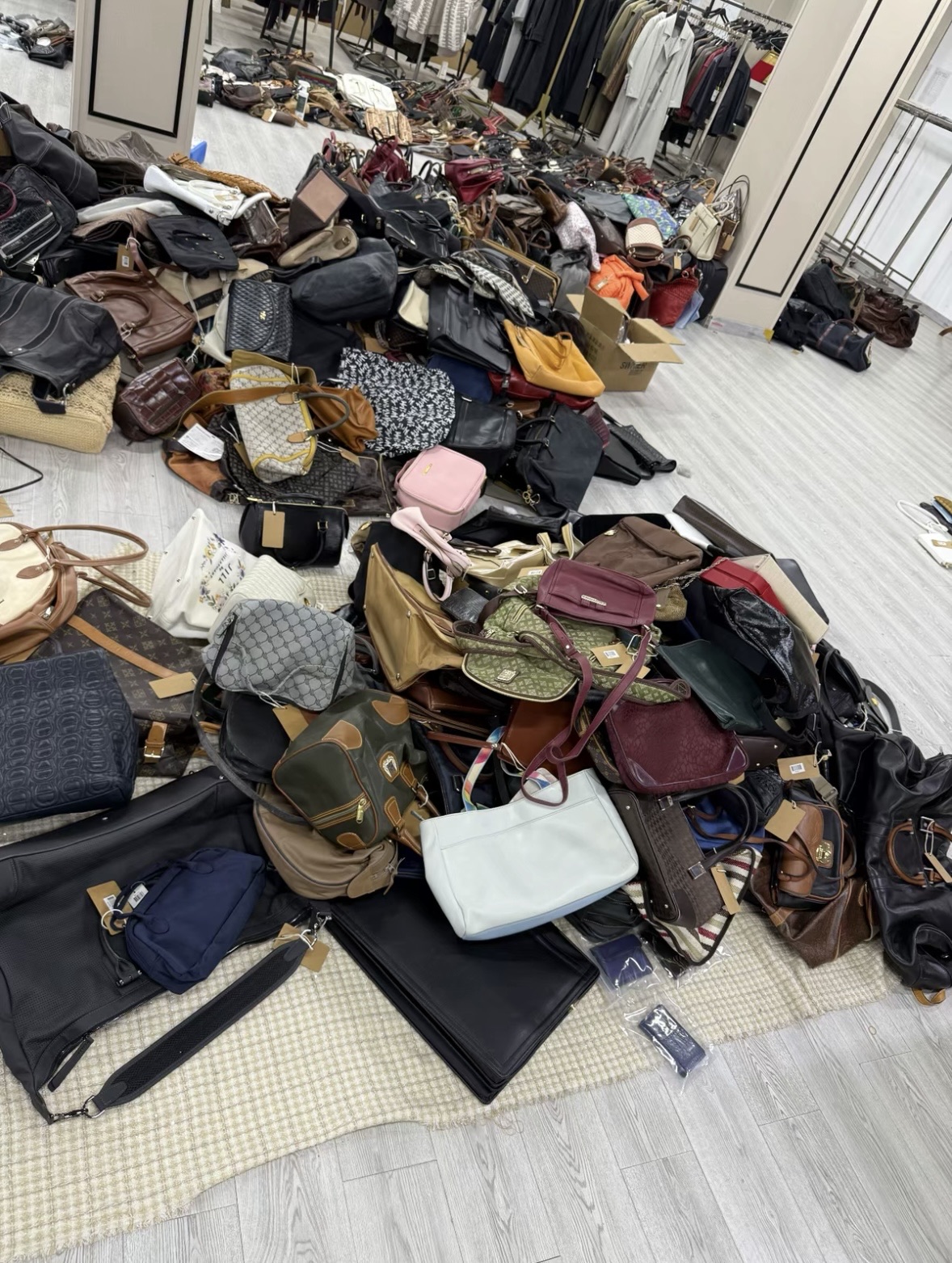 Bulk preloved bags prepared for wholesale orders